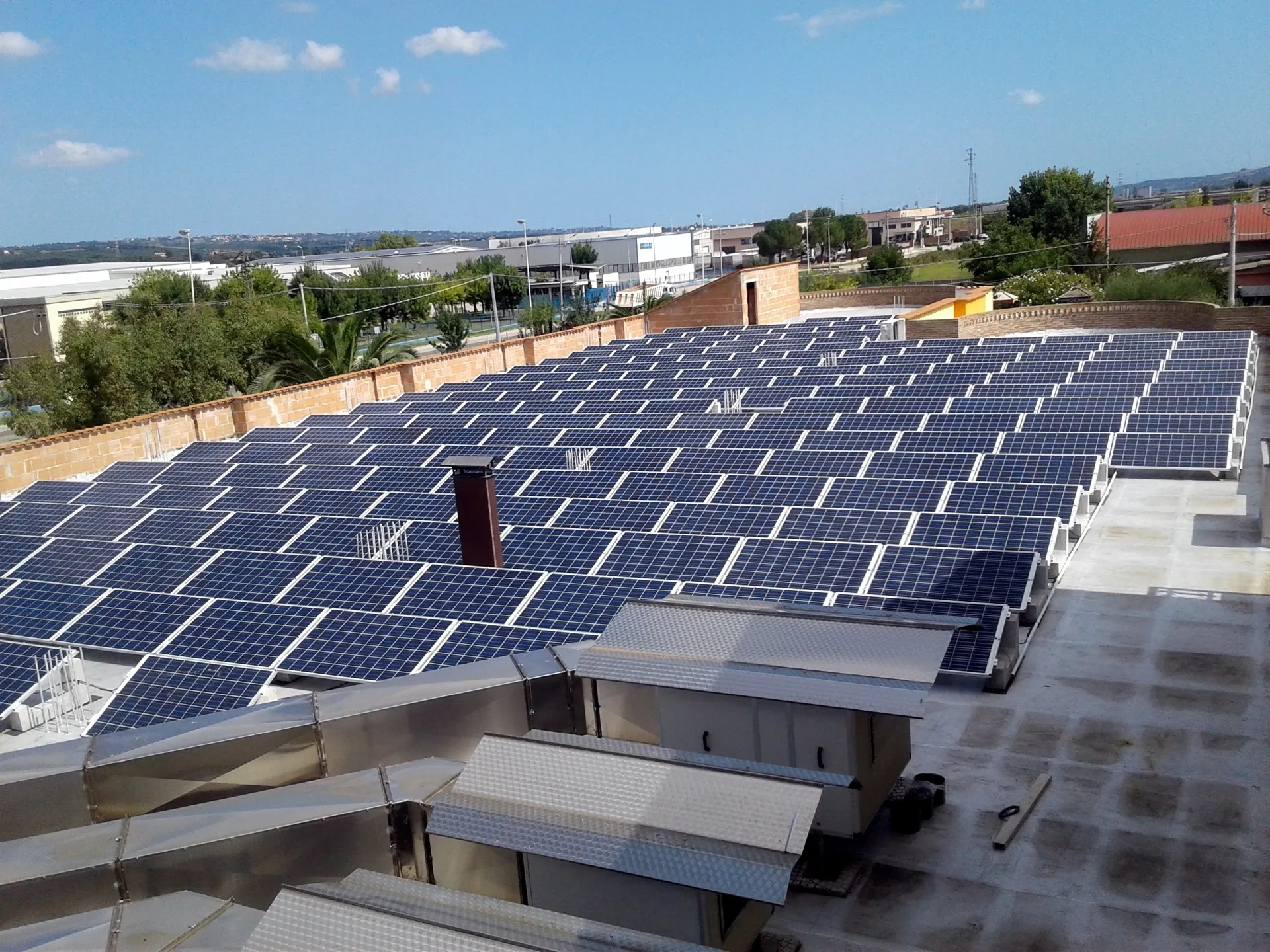 Solar system on the flat roof of an industrial building