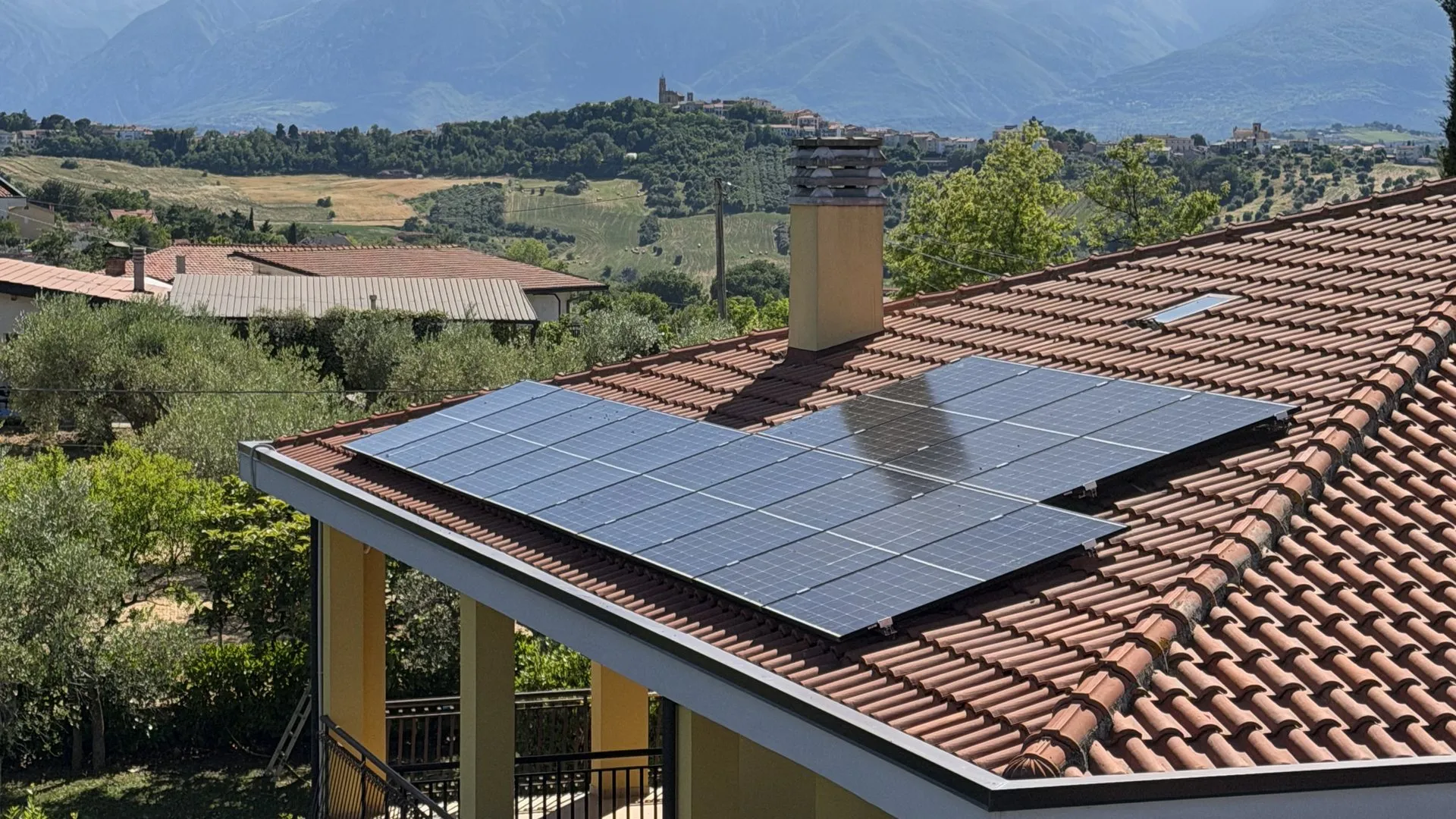 Villa with a New Energy rooftop solar system, Gran Sasso in the background